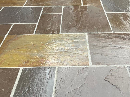 Riven slate paving with hand finished pointing